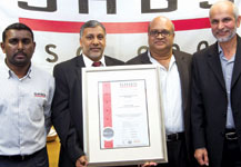 From left: Lenny Naidu (SABS), Terence Gordon (SABS), Collin Chetty (Autotronix), Haroon Bassa (Autotronix).